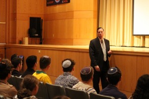 Ari Schonbrun speaking at Kushner high school